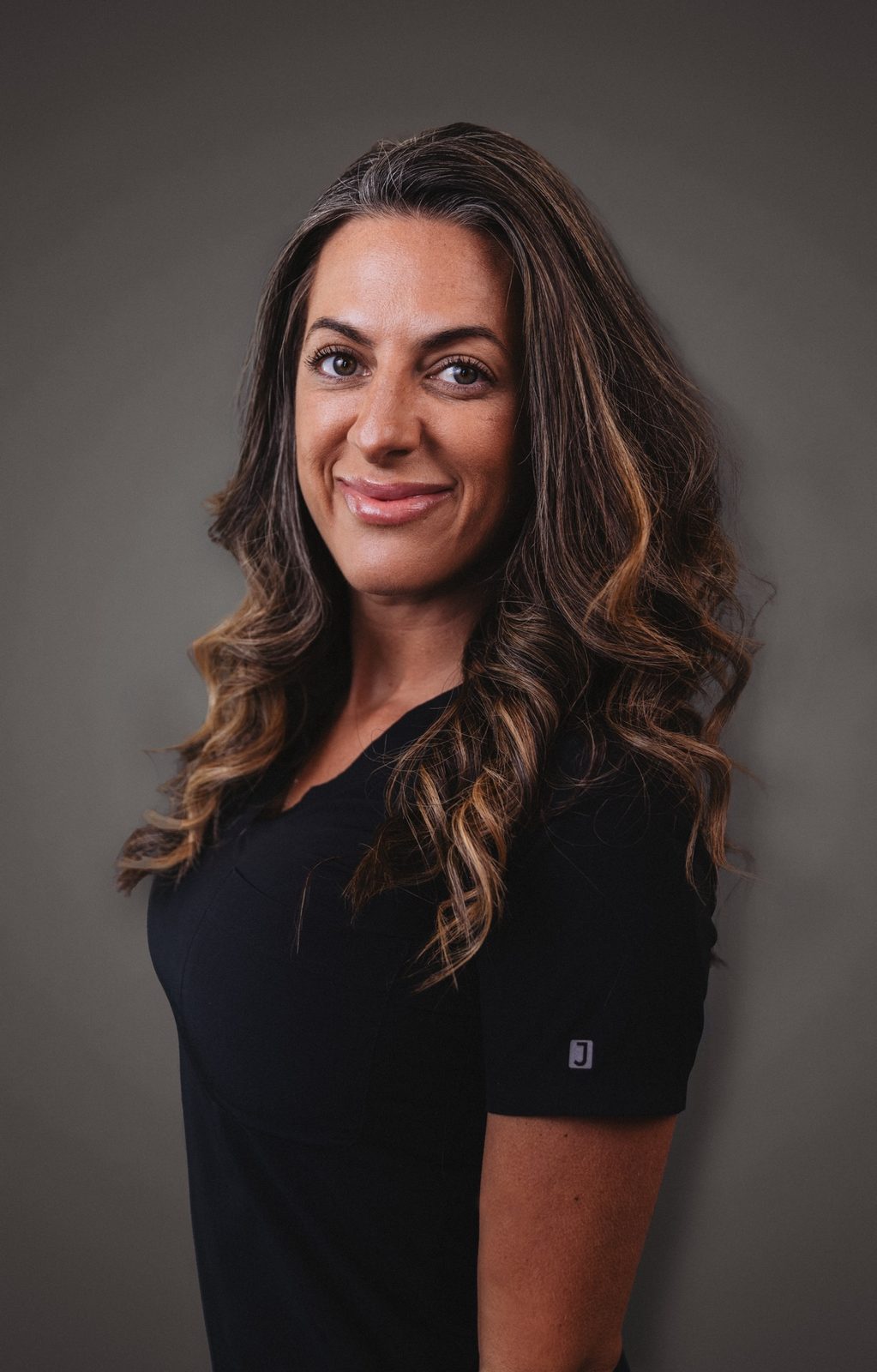 Professional headshot — Brit